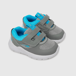 Zapatilla deportiva de niño caña baja gris